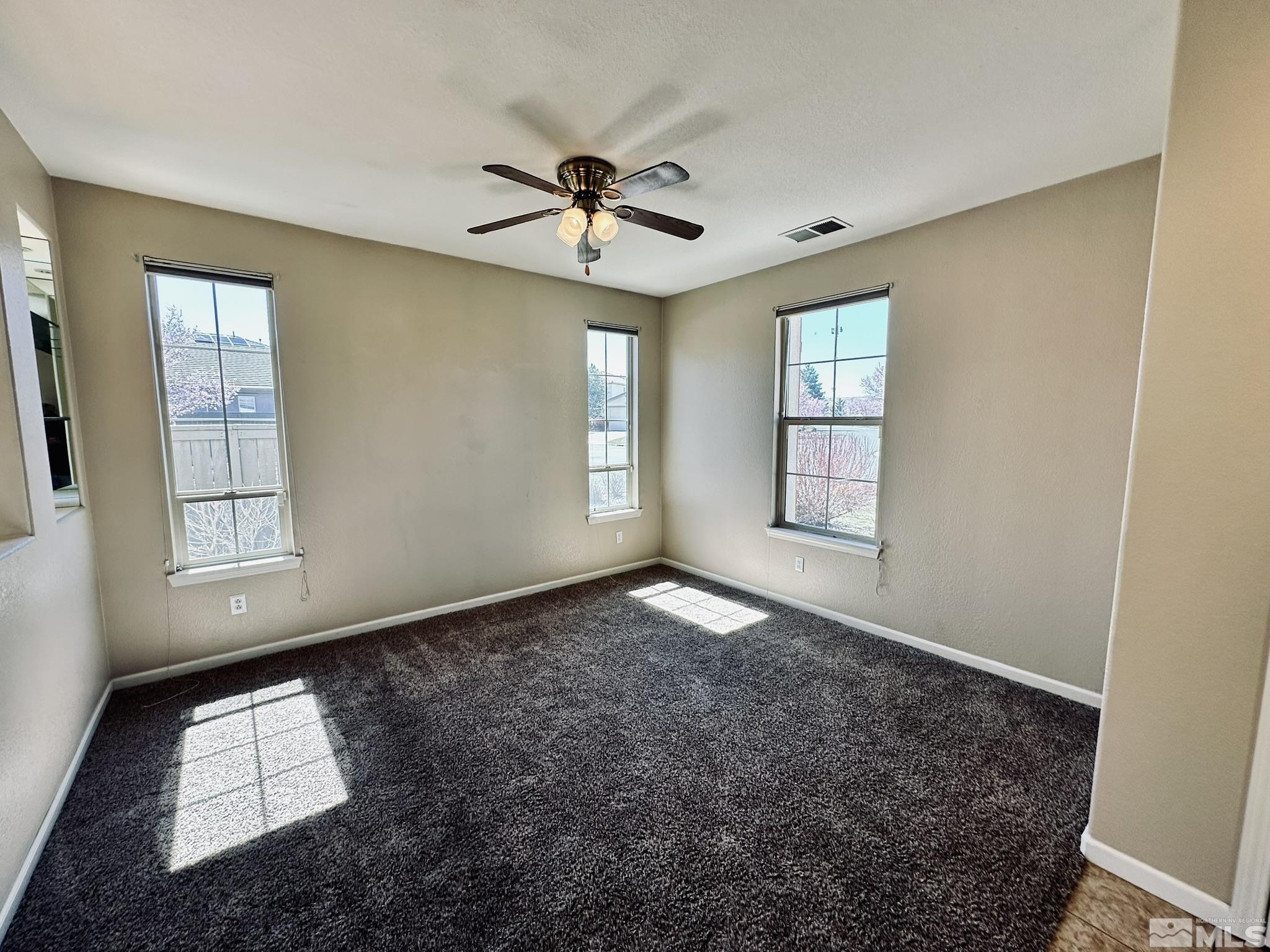 491 Oldenburg Drive Reno, NV 89521 - Photo 4 of 36 a view of empty room with window