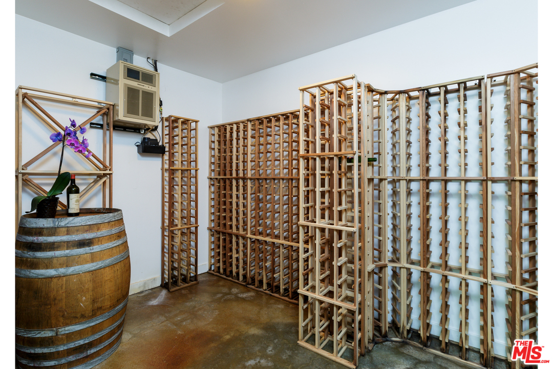 27366 Winding Way Malibu, CA 90265 - Photo 32 of 43 a view of entryway with wooden walls