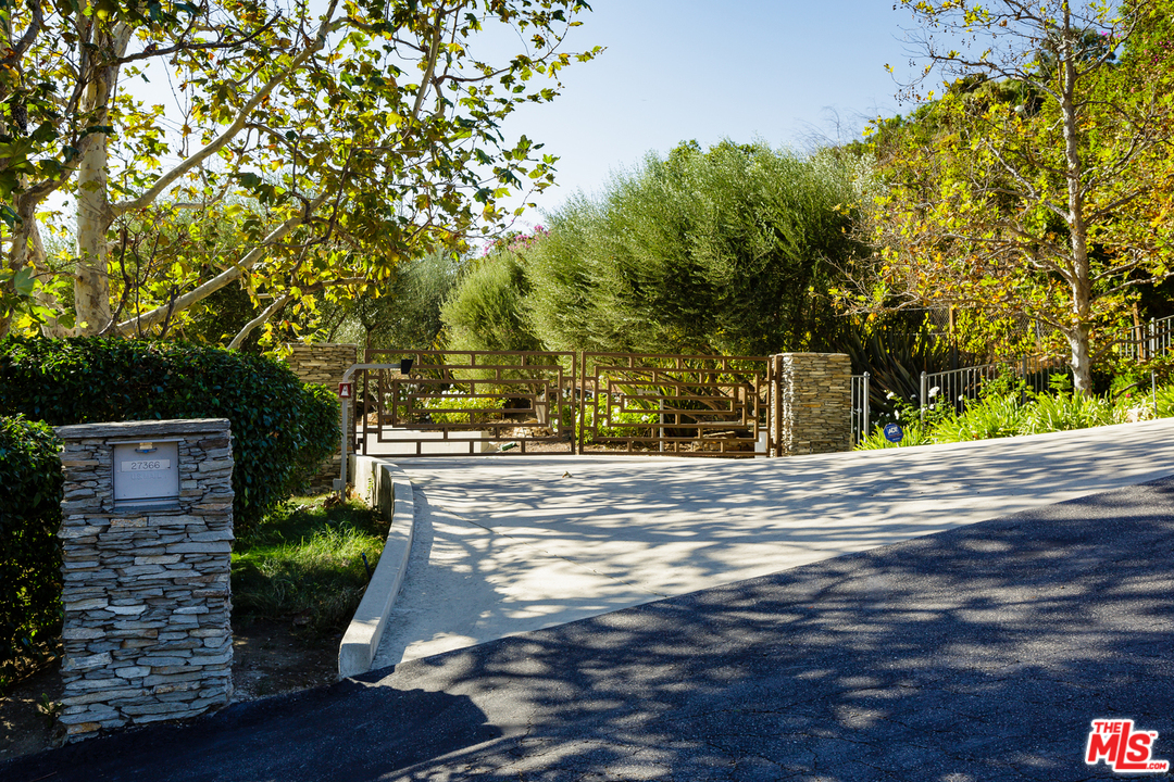 27366 Winding Way Malibu, CA 90265 - Photo 41 of 43 a view of a yard with plants and trees