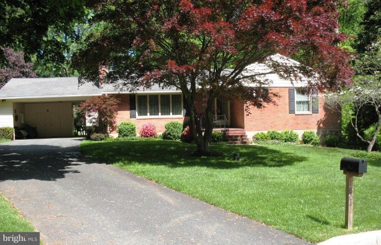 1604 Pinnacle Road Towson, MD 21286 - Photo 1 of 22 a front view of a house with garden