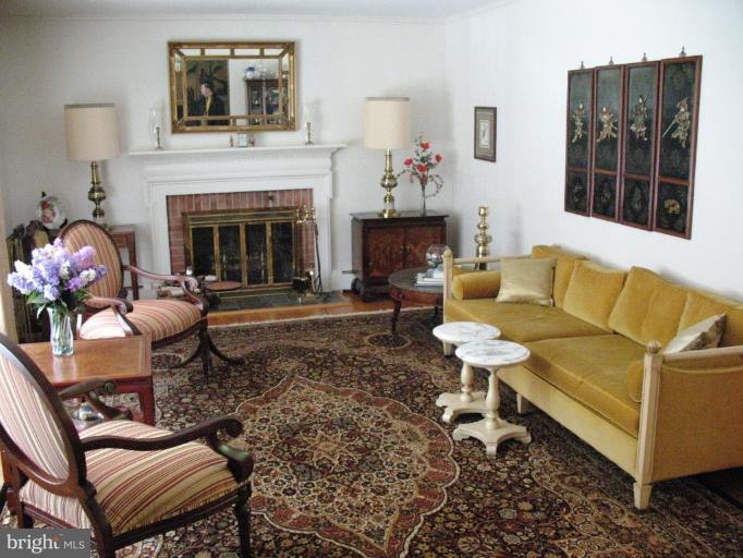 1604 Pinnacle Road Towson, MD 21286 - Photo 18 of 22 a living room with furniture and a fireplace