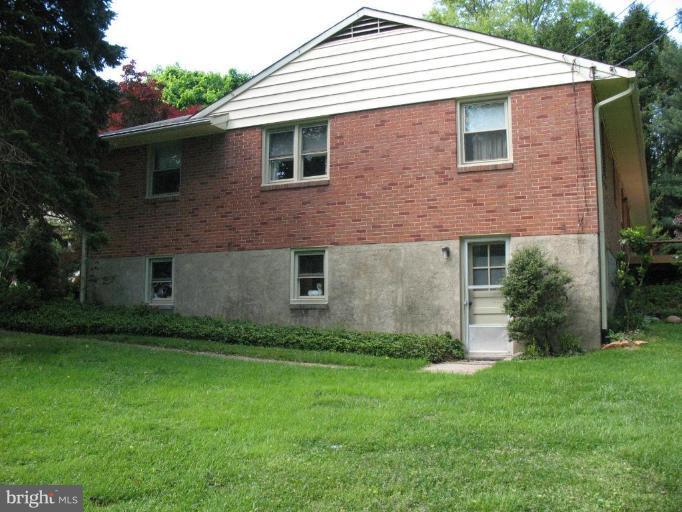 1604 Pinnacle Road Towson, MD 21286 - Photo 21 of 22 a front view of a house with a yard