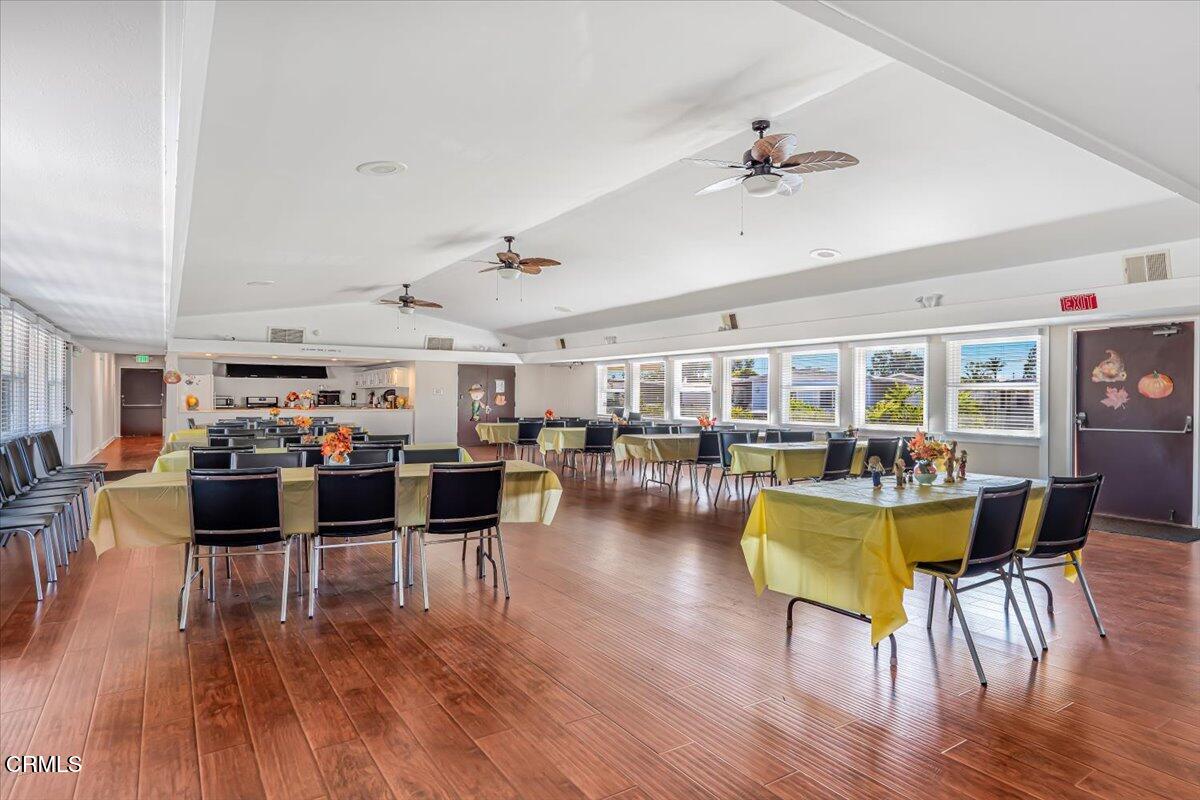 145 Ibsen Place, Unit 3 Oxnard, CA 93033 - Photo 37 of 47 a living room with furniture and a wooden floor