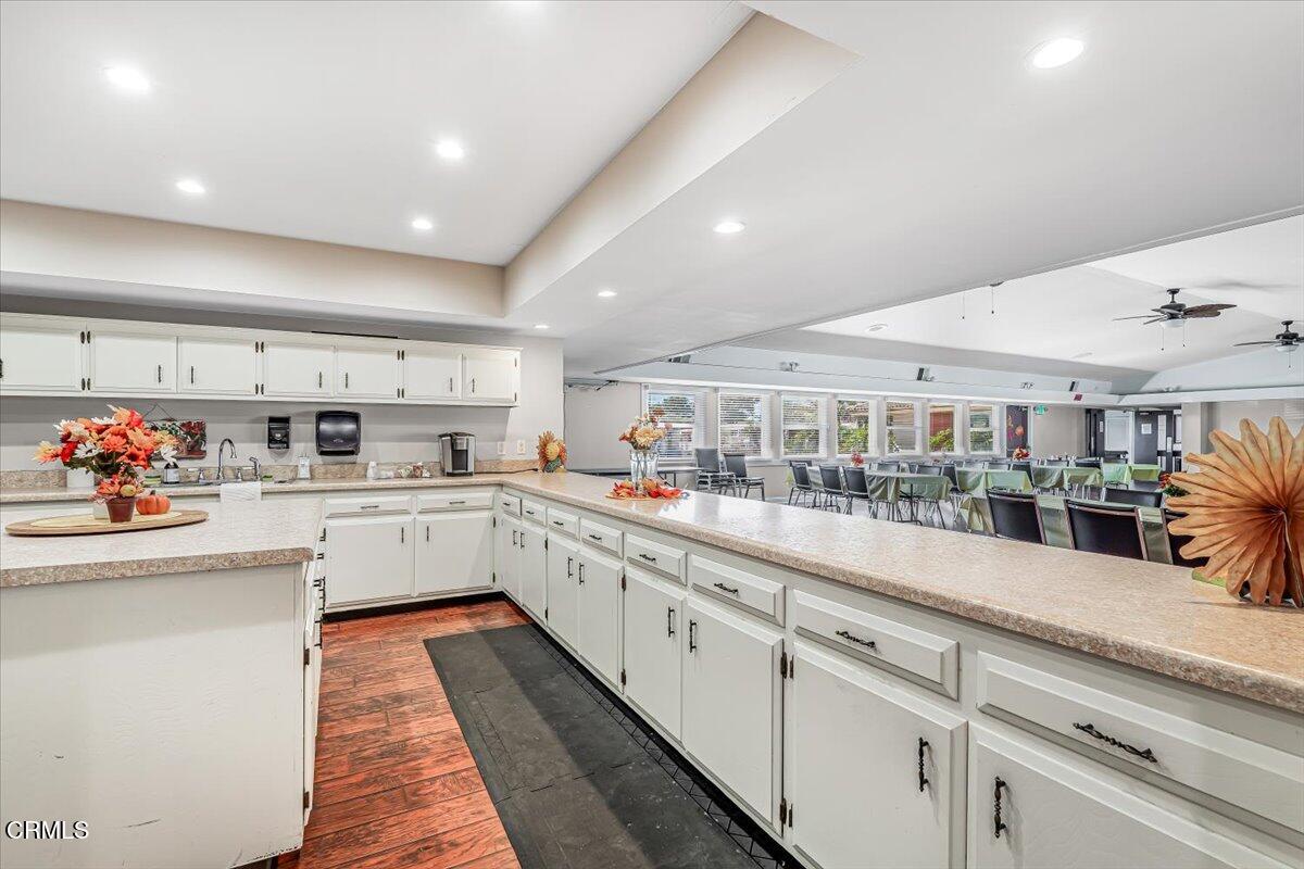 145 Ibsen Place, Unit 3 Oxnard, CA 93033 - Photo 41 of 47 a kitchen with stainless steel appliances granite countertop lots of counter top space and cabinets
