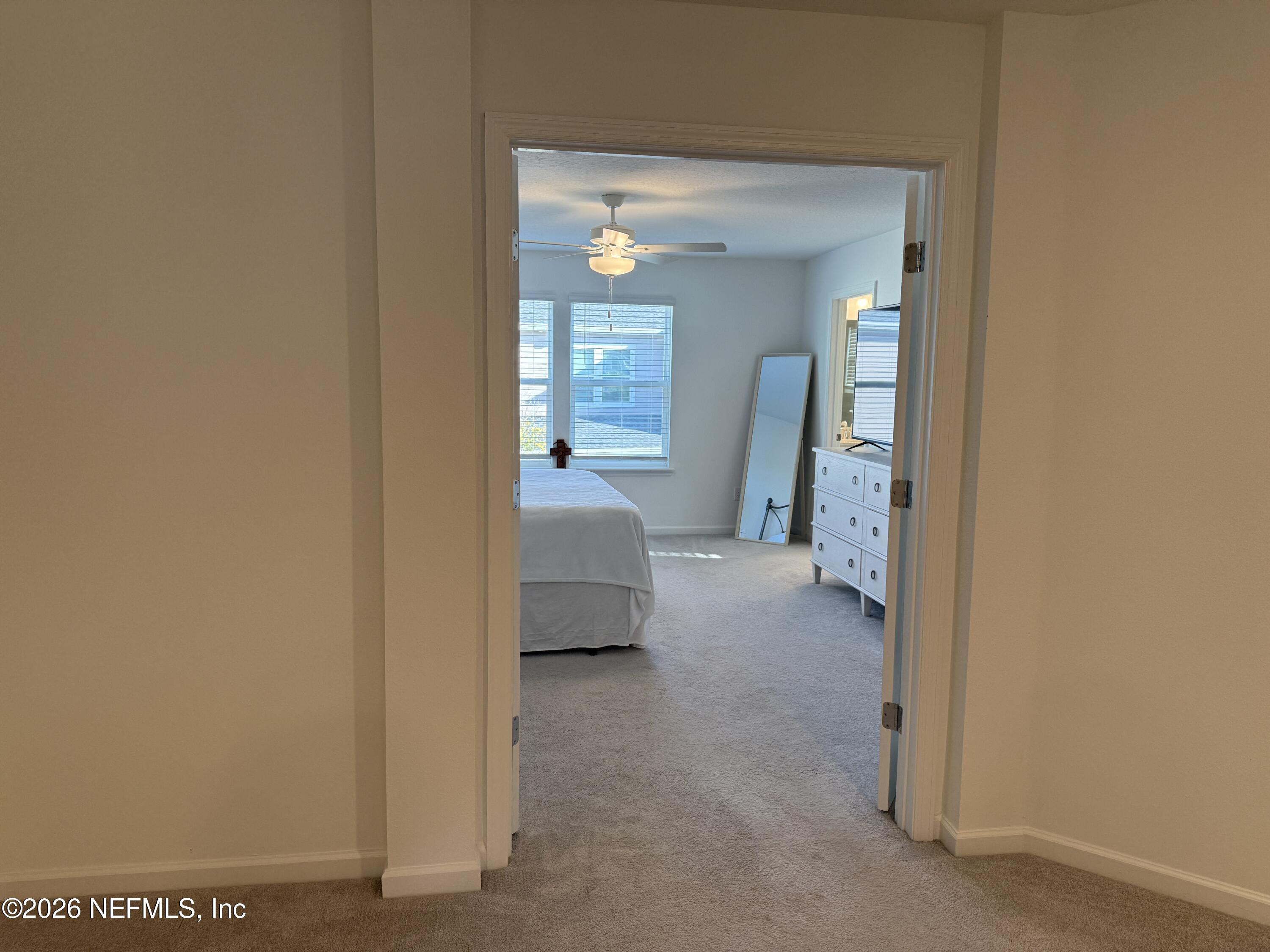 72 Bramble Court St. Augustine, FL 32092 - Photo 17 of 35 a view of a bedroom from a hallway