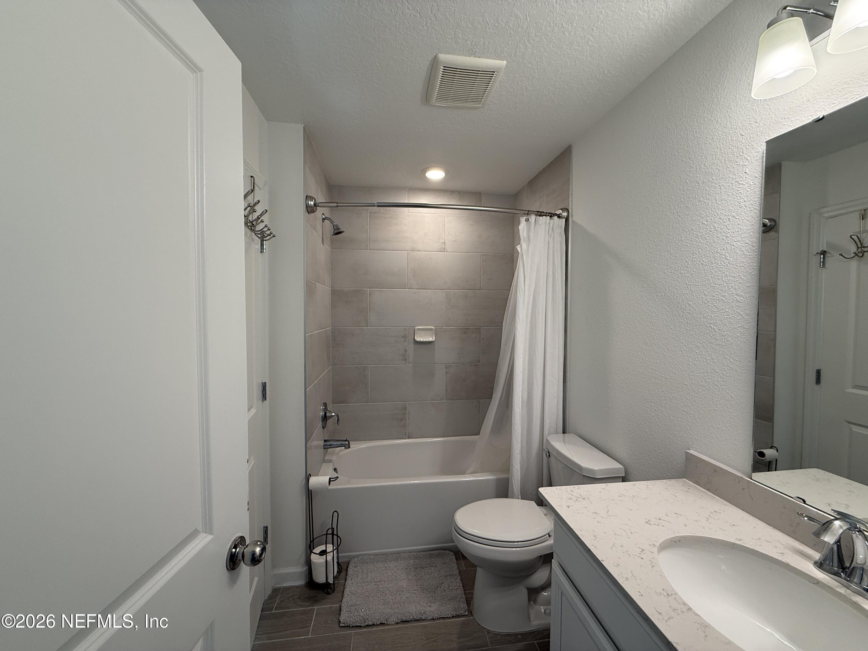 72 Bramble Court St. Augustine, FL 32092 - Photo 29 of 35 a bathroom with a sink toilet and shower