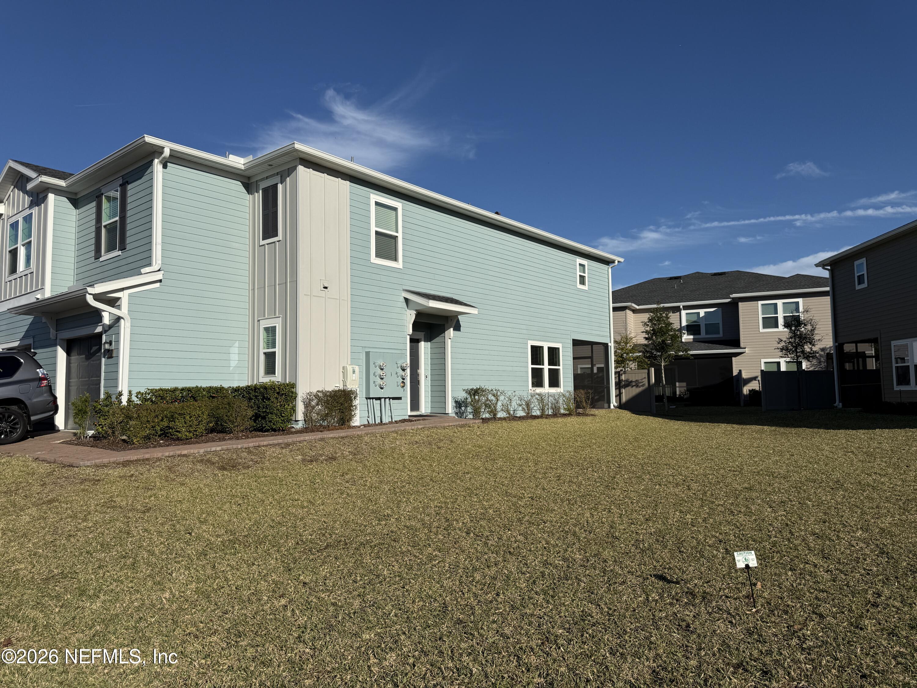 72 Bramble Court St. Augustine, FL 32092 - Photo 35 of 35 a front view of a house with a yard