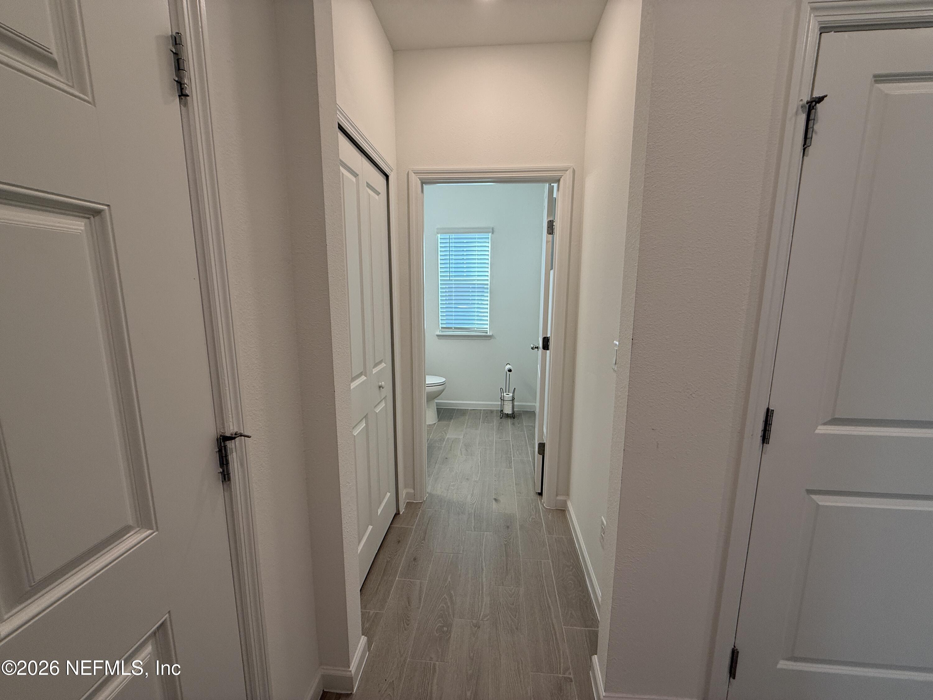 72 Bramble Court St. Augustine, FL 32092 - Photo 5 of 35 a view of a bathroom from a hallway