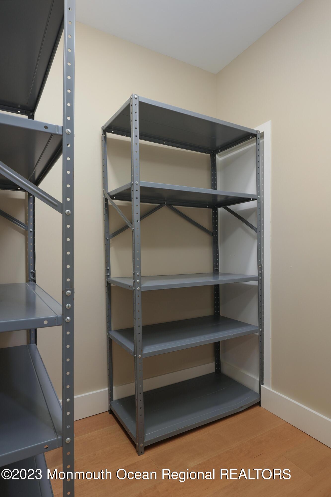 29 Manchester Court Red Bank, NJ 07701 - Photo 22 of 49 a view of walk in closet with empty racks