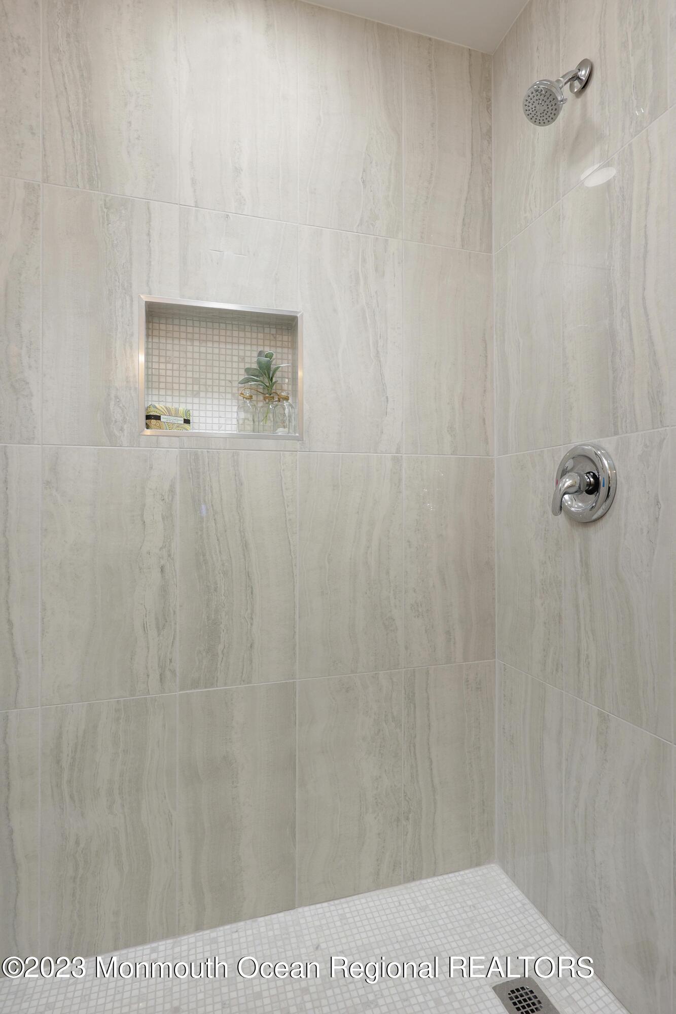 29 Manchester Court Red Bank, NJ 07701 - Photo 28 of 49 a picture of a bathroom with a shower curtain