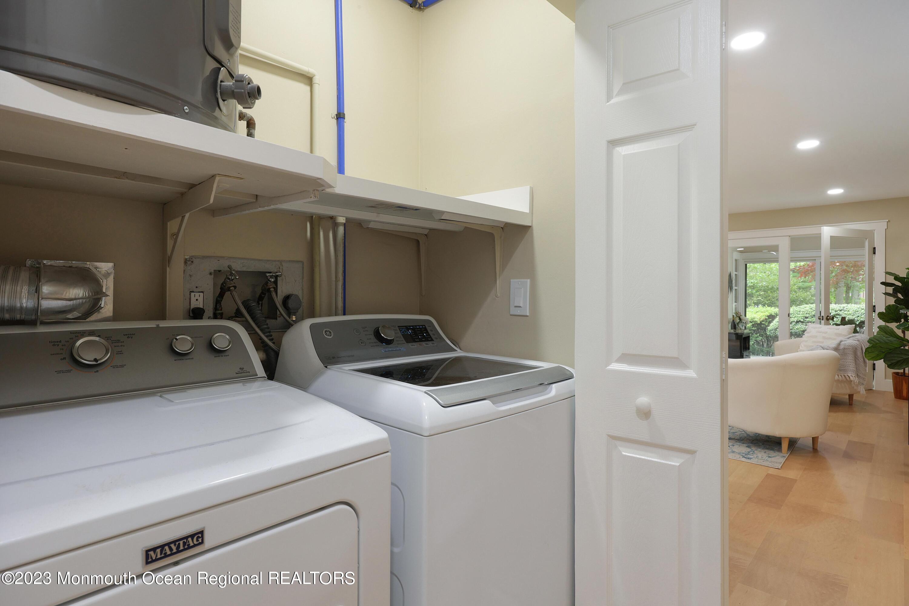 29 Manchester Court Red Bank, NJ 07701 - Photo 29 of 49 a utility room with dryer and washer