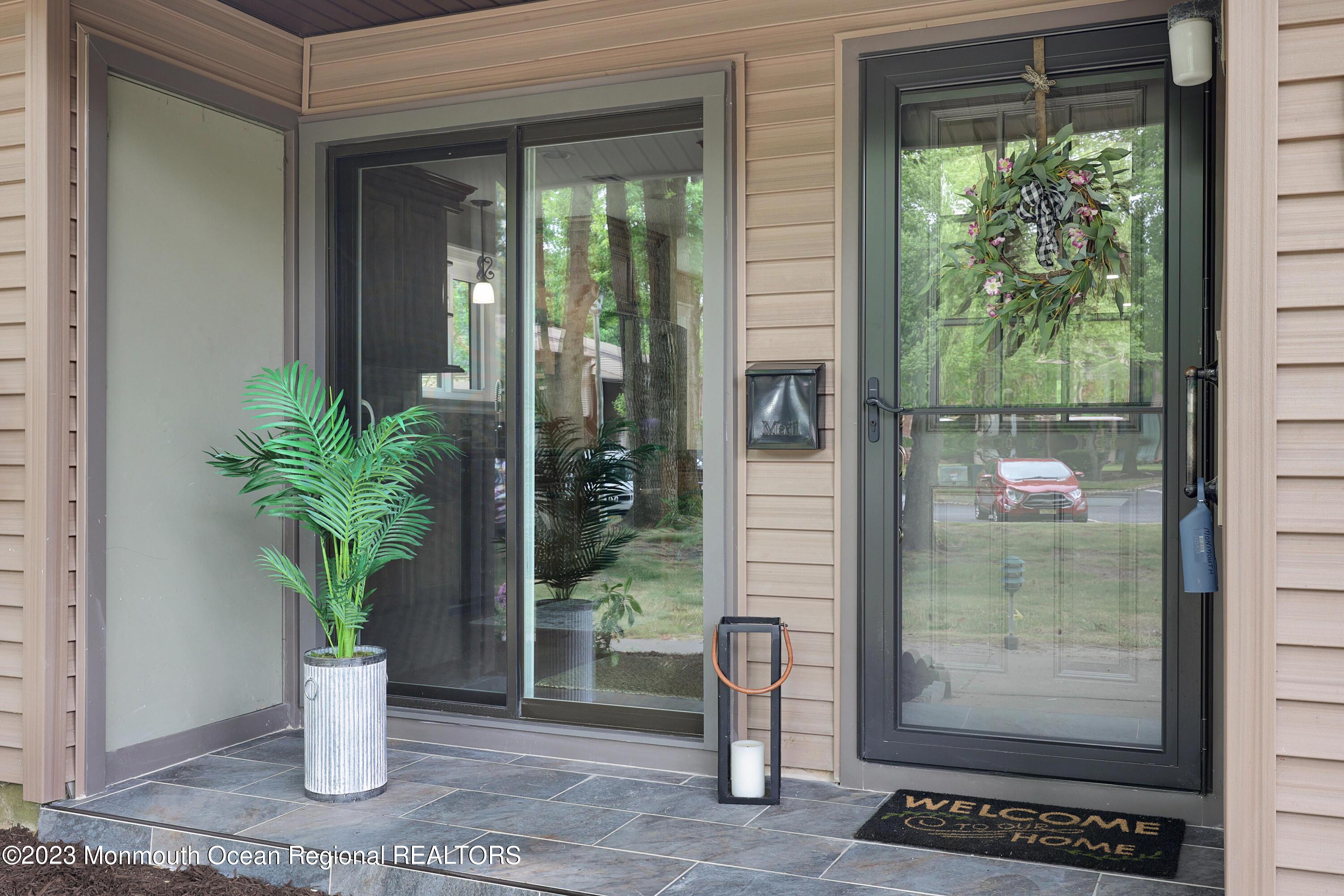 29 Manchester Court Red Bank, NJ 07701 - Photo 7 of 49 a view of a entryway door of the house