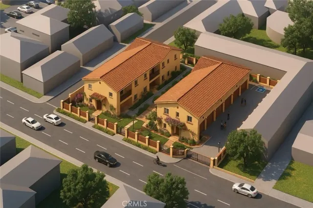 an aerial view of a building with garden