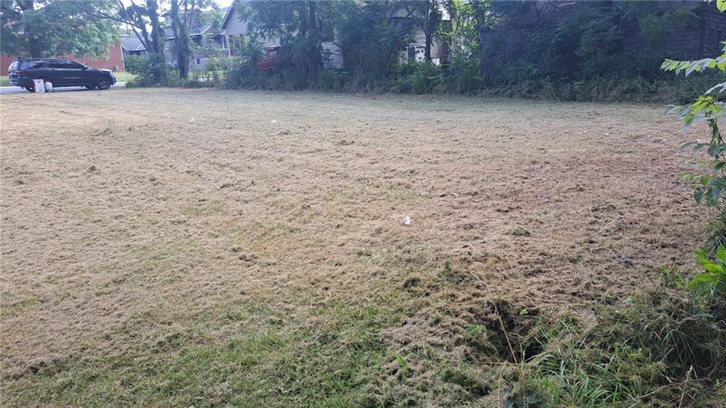 131 Hopwood Coolspring Road Hopwood, PA 15445 - Photo 6 of 12 a view of a yard with a trees