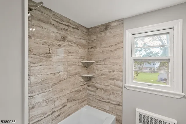 a bathroom with a window