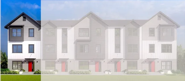 a front view of residential houses with street