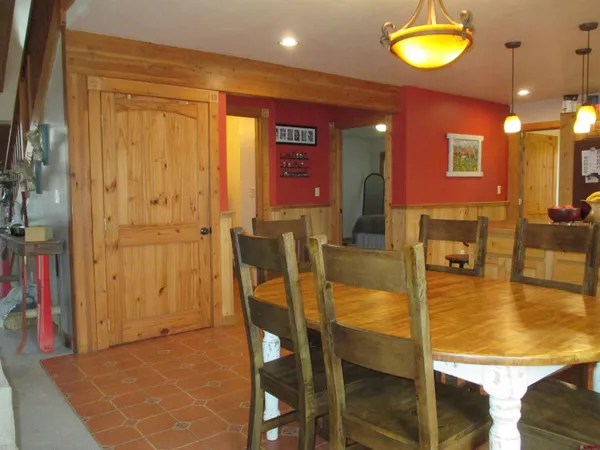 a view of a dining room with furniture