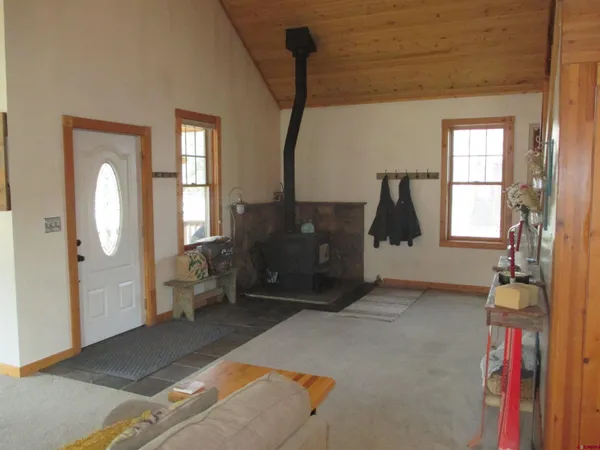 a living room with furniture and a gate