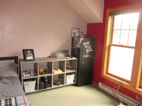 a view of a livingroom with furniture and window