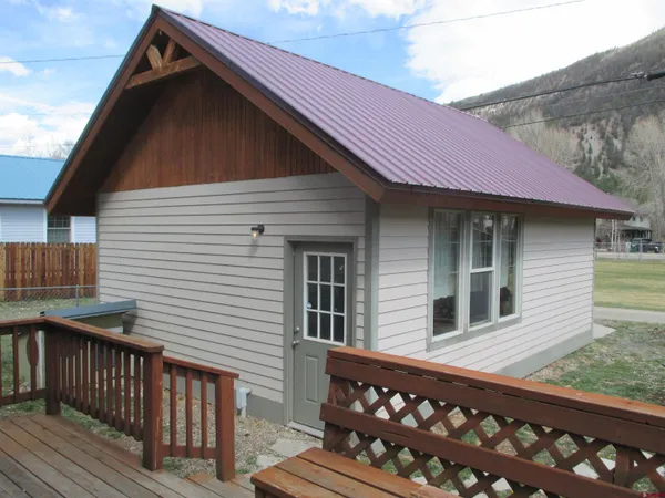 a view of a house with a deck