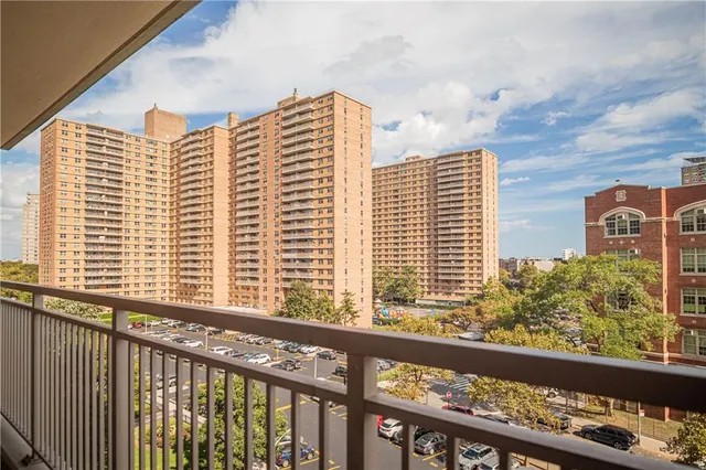 a view of a balcony and trees