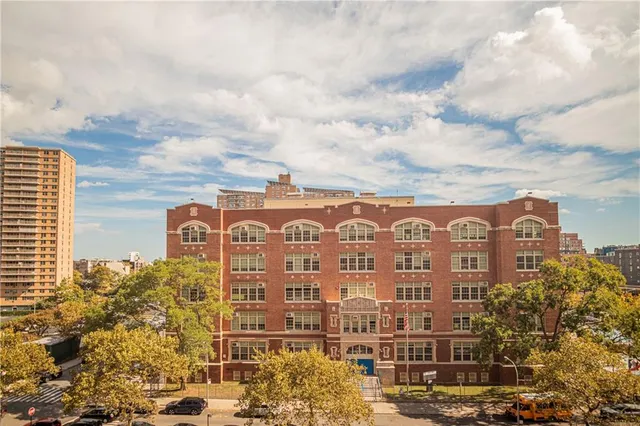 a view of a large building with a city view
