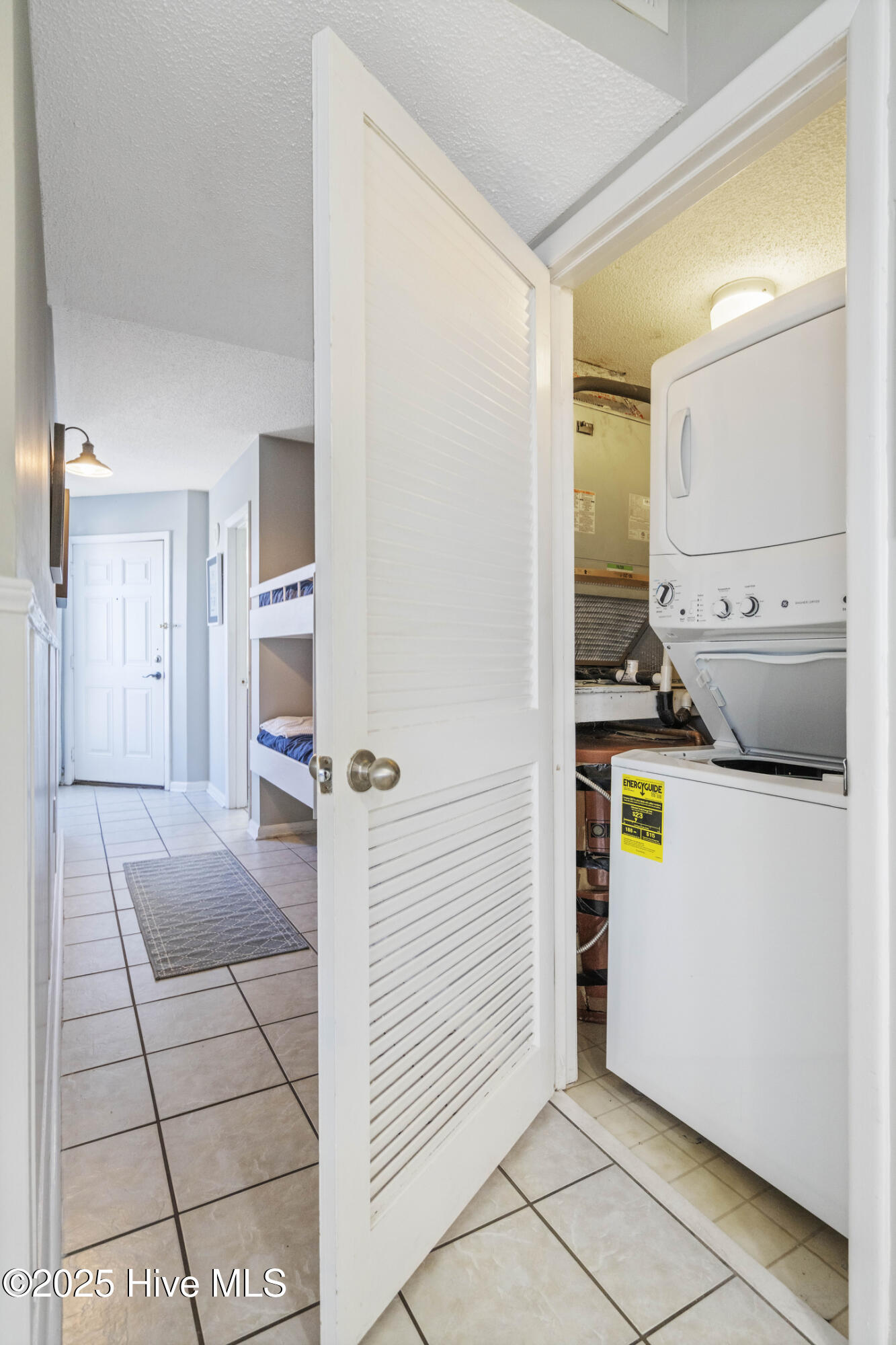 2000 New River Inlet Road, Unit 3101 North Topsail Beach, NC 28460 - Photo 8 of 50 Washer & dryer closet