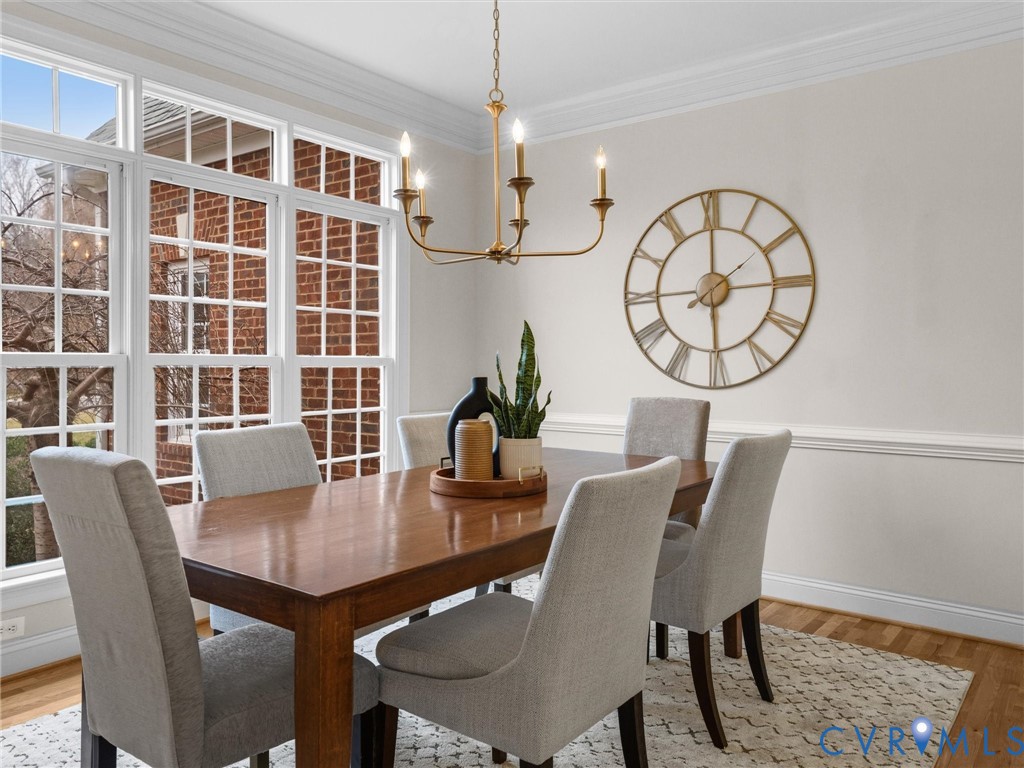 14335 Lander Road Midlothian, VA 23113 - Photo 14 of 70 a view of a dining room with furniture window and wooden floor