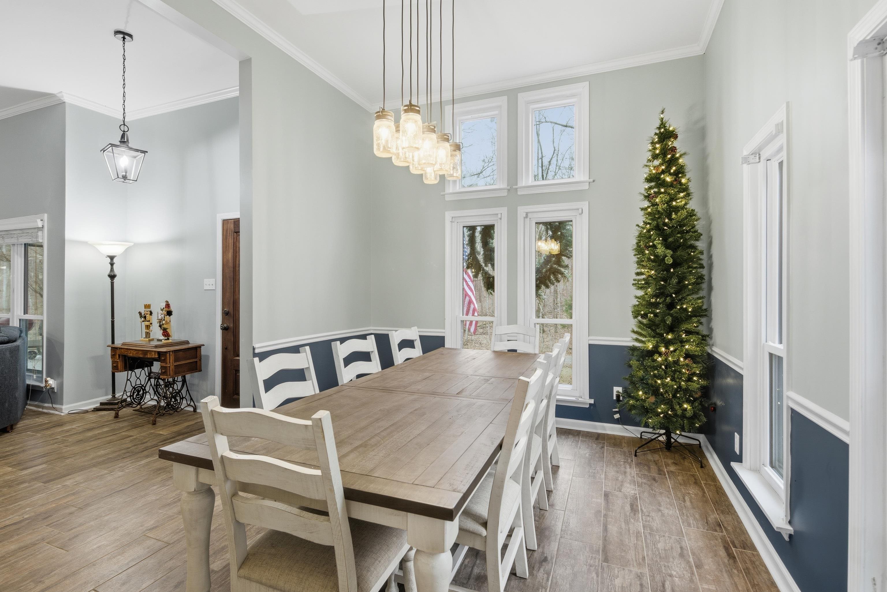 1755 Country Club Road Somerville, TN 38068 - Photo 16 of 40 a view of a dining room with furniture window and wooden floor