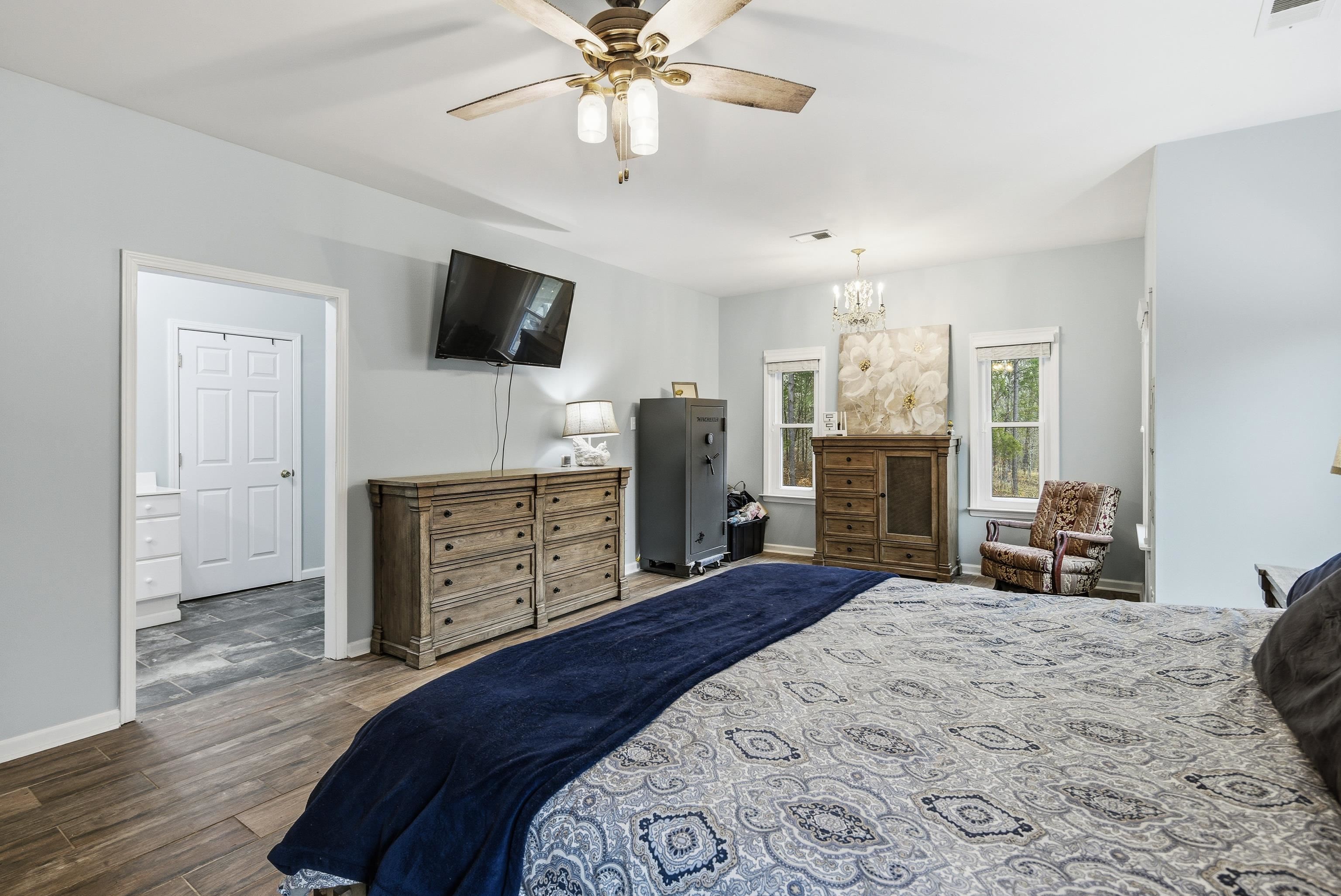 1755 Country Club Road Somerville, TN 38068 - Photo 27 of 40 a bedroom with a bed and flat screen tv