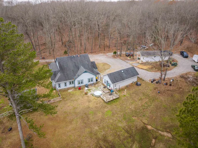 a view of a house with a swimming pool