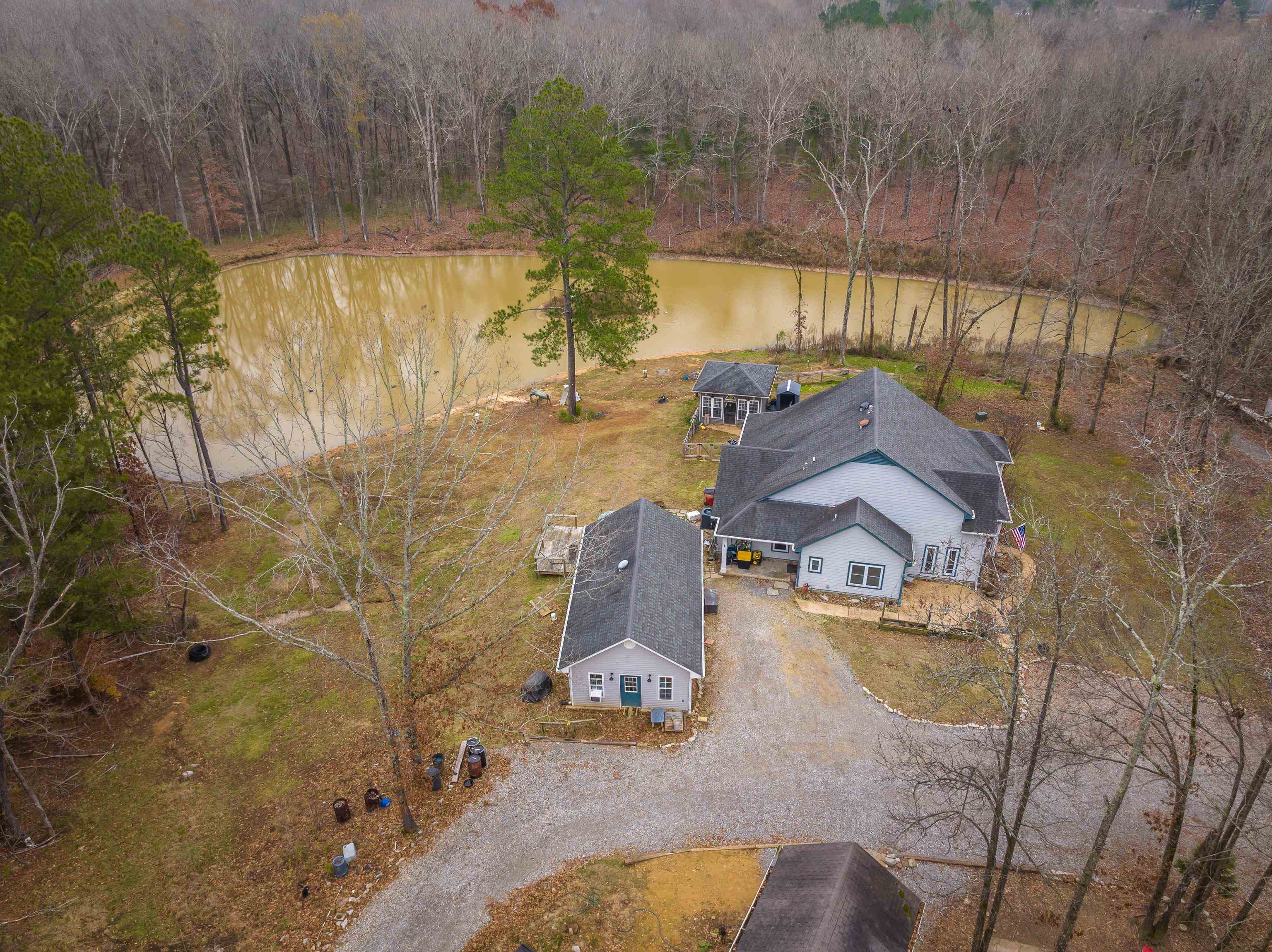 1755 Country Club Road Somerville, TN 38068 - Photo 6 of 40 an aerial view of a house with a yard and lake view