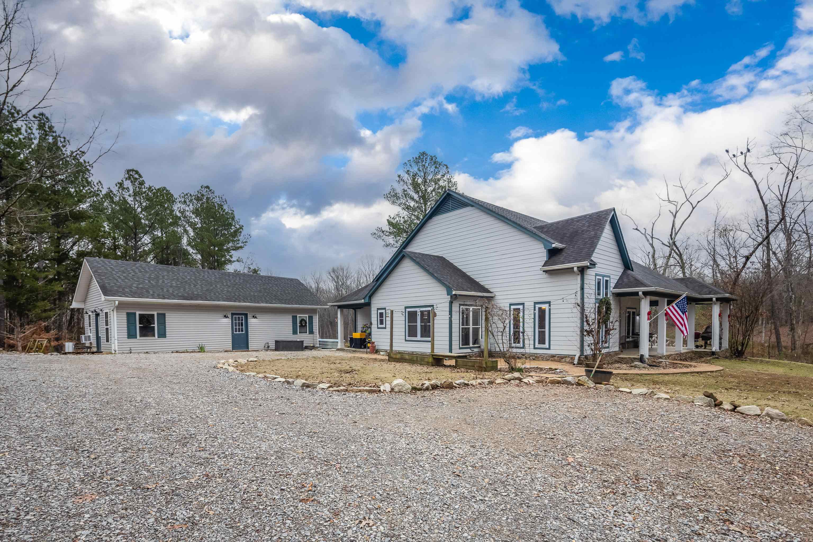 1755 Country Club Road Somerville, TN 38068 - Photo 10 of 40 a front view of a house with a yard