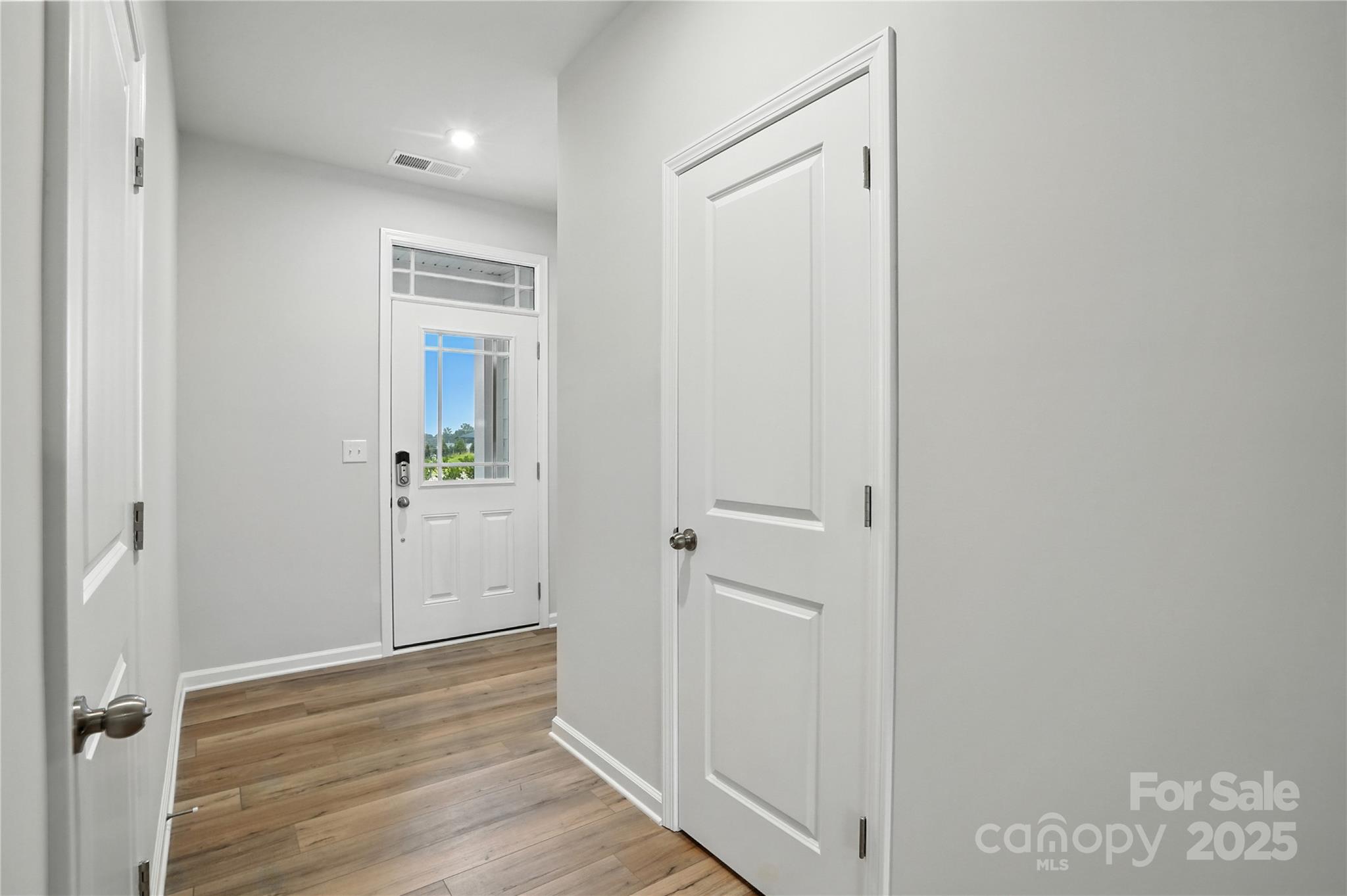 640 Cassidy Court Clover, SC 29710 - Photo 4 of 29 a view of a hallway with wooden floor