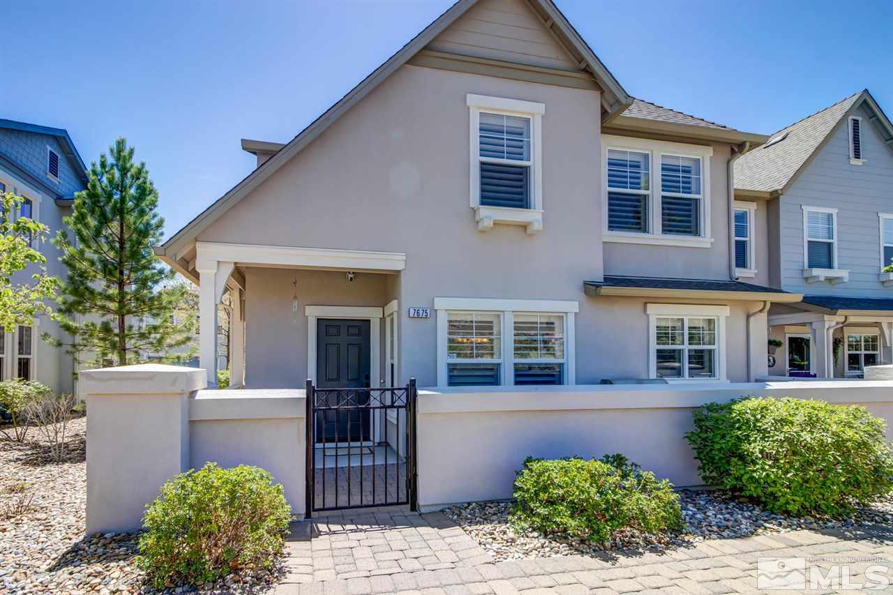 7675 Pebblestone Way Reno, NV 89523 - Photo 1 of 25 a front view of a house with garden