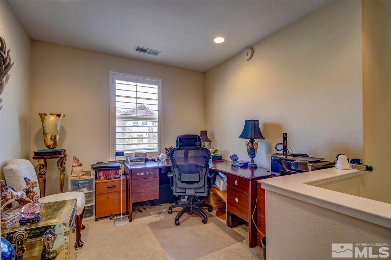 7675 Pebblestone Way Reno, NV 89523 - Photo 12 of 25 a view of a workspace with furniture and a window