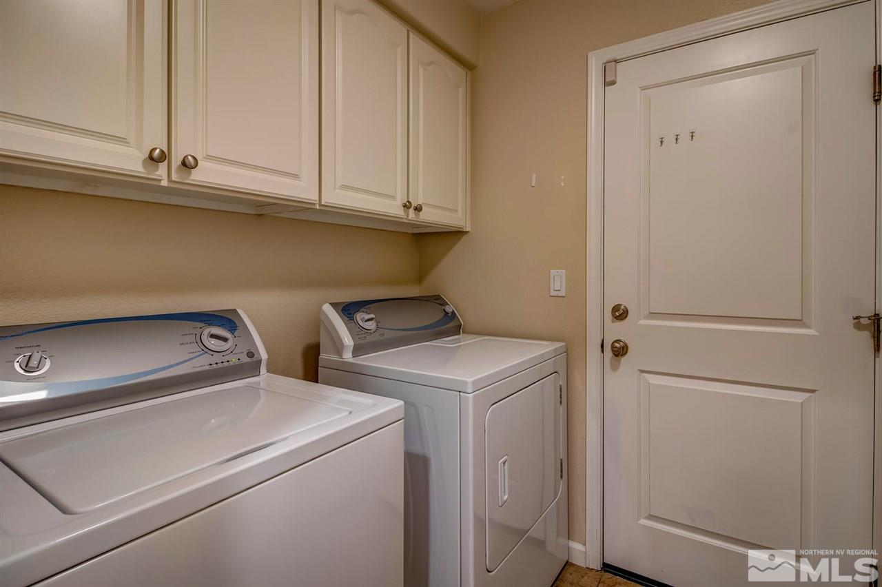 7675 Pebblestone Way Reno, NV 89523 - Photo 18 of 25 a utility room with dryer and washer