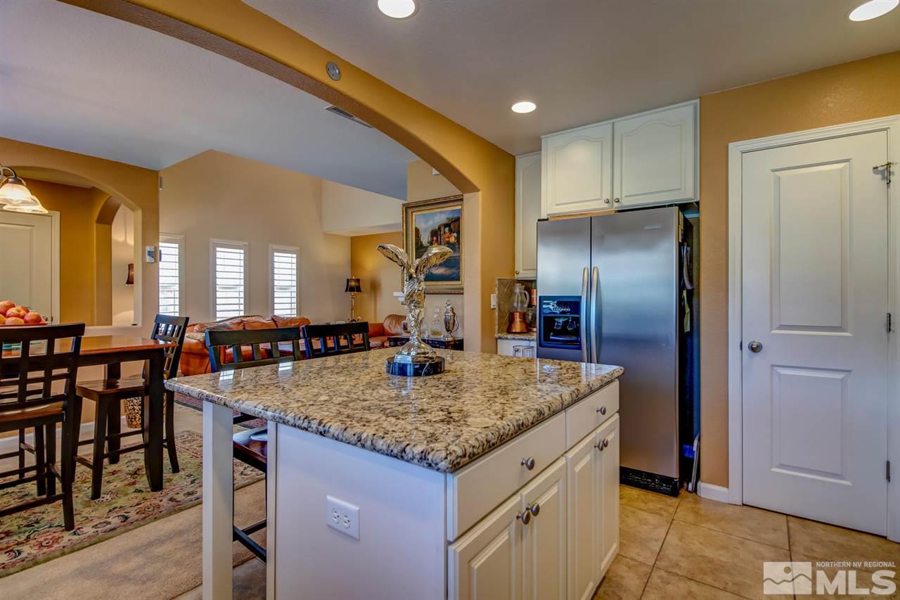 7675 Pebblestone Way Reno, NV 89523 - Photo 9 of 25 a view of living room and kitchen