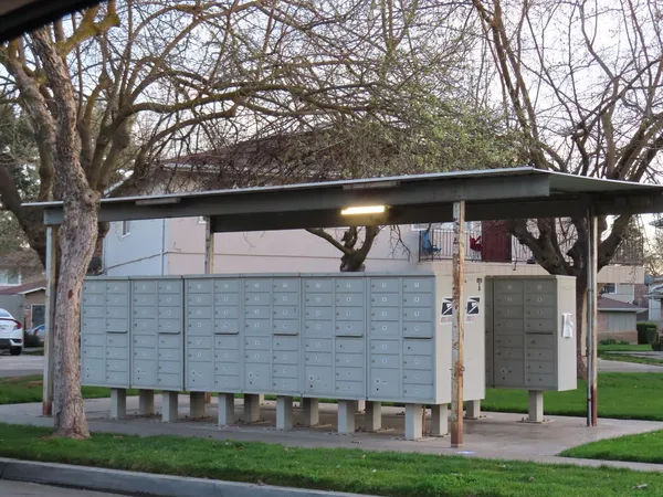 a view of house with yard
