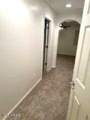 en empty room with wooden floor