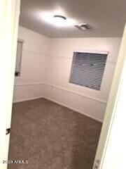 14039 West Country Gables Drive Surprise, AZ 85379 - Photo 22 of 32 a view of an empty room