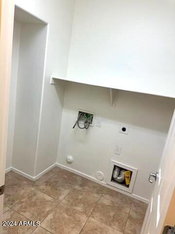 14039 West Country Gables Drive Surprise, AZ 85379 - Photo 26 of 32 a view of a livingroom with an empty space and a window