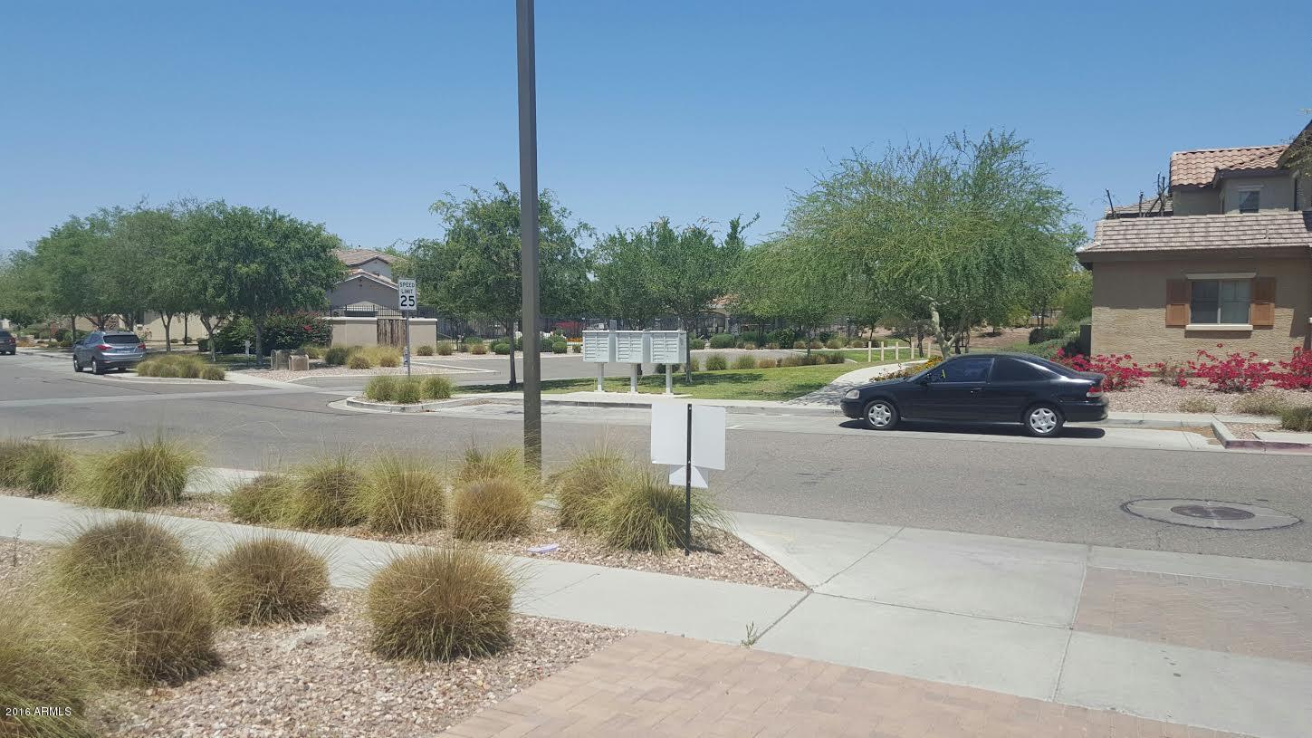 14039 West Country Gables Drive Surprise, AZ 85379 - Photo 31 of 32 a swimming pool view with a outdoor space