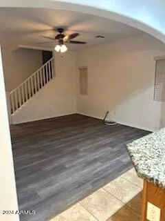 a view of a livingroom with wooden floor