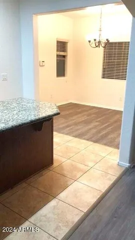 a white toilet sitting next to a small sink