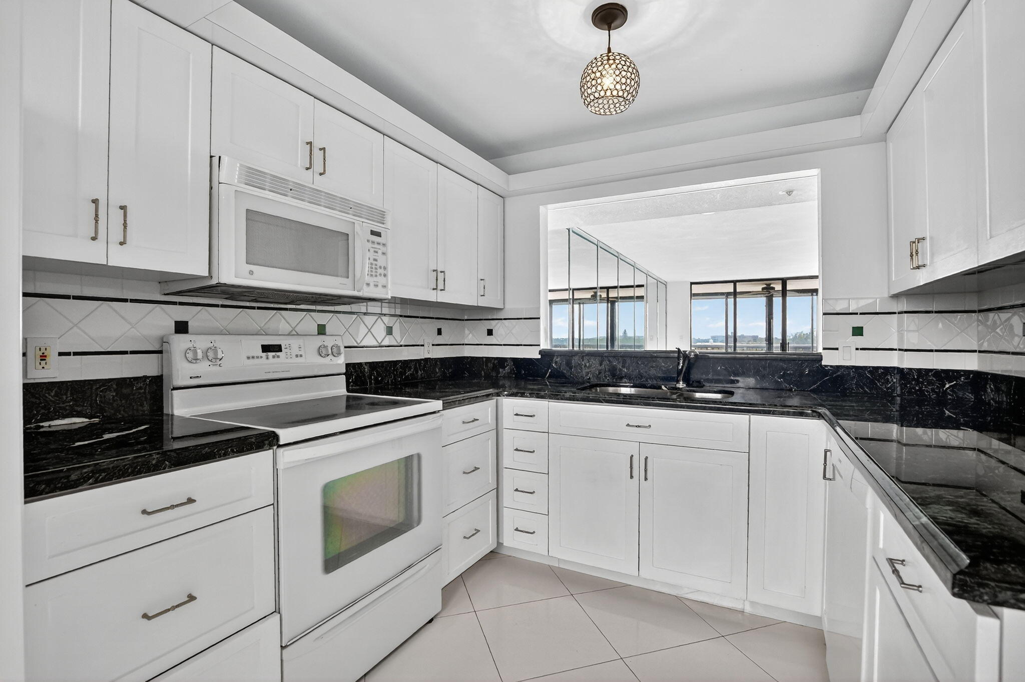 6620 Boca Del Mar Drive, Unit 706 Boca Raton, FL 33433 - Photo 9 of 41 Kitchen