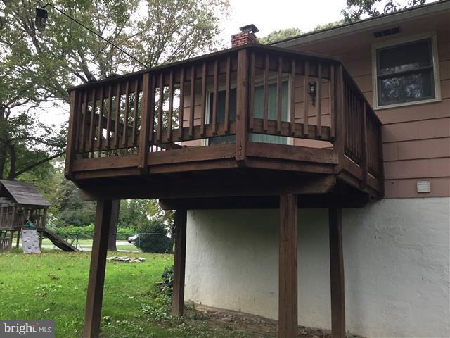 166 Dundee Road Severna Park, MD 21146 - Photo 2 of 25 a view of backyard with deck and outdoor seating