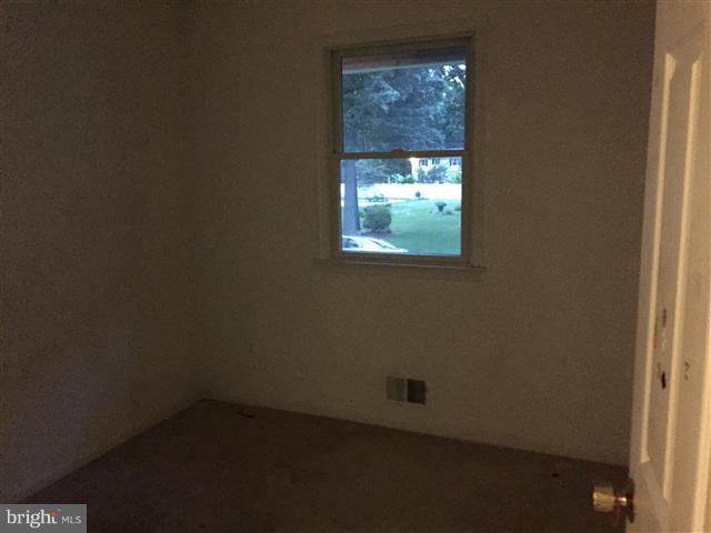 166 Dundee Road Severna Park, MD 21146 - Photo 11 of 25 an empty room with windows