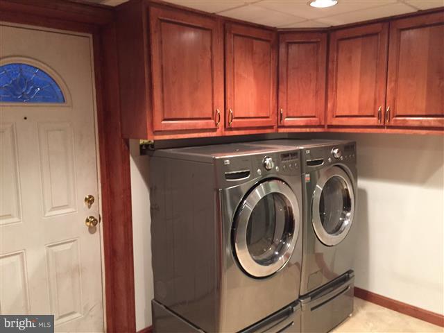 166 Dundee Road Severna Park, MD 21146 - Photo 15 of 25 a utility room with dryer and washer