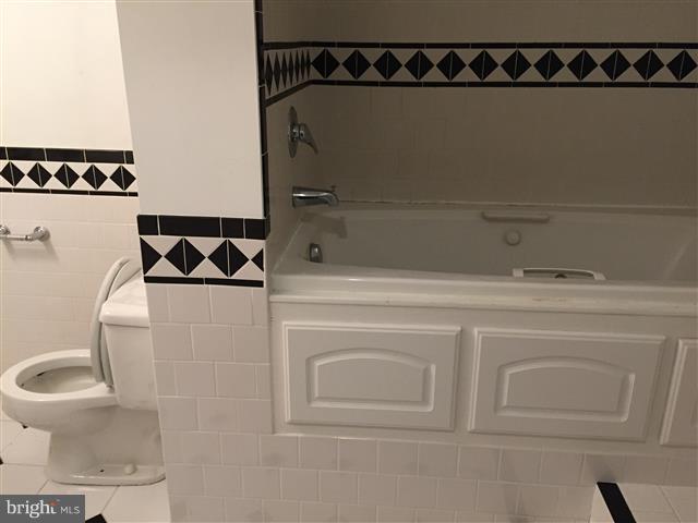 166 Dundee Road Severna Park, MD 21146 - Photo 16 of 25 a bathroom with a toilet and a sink